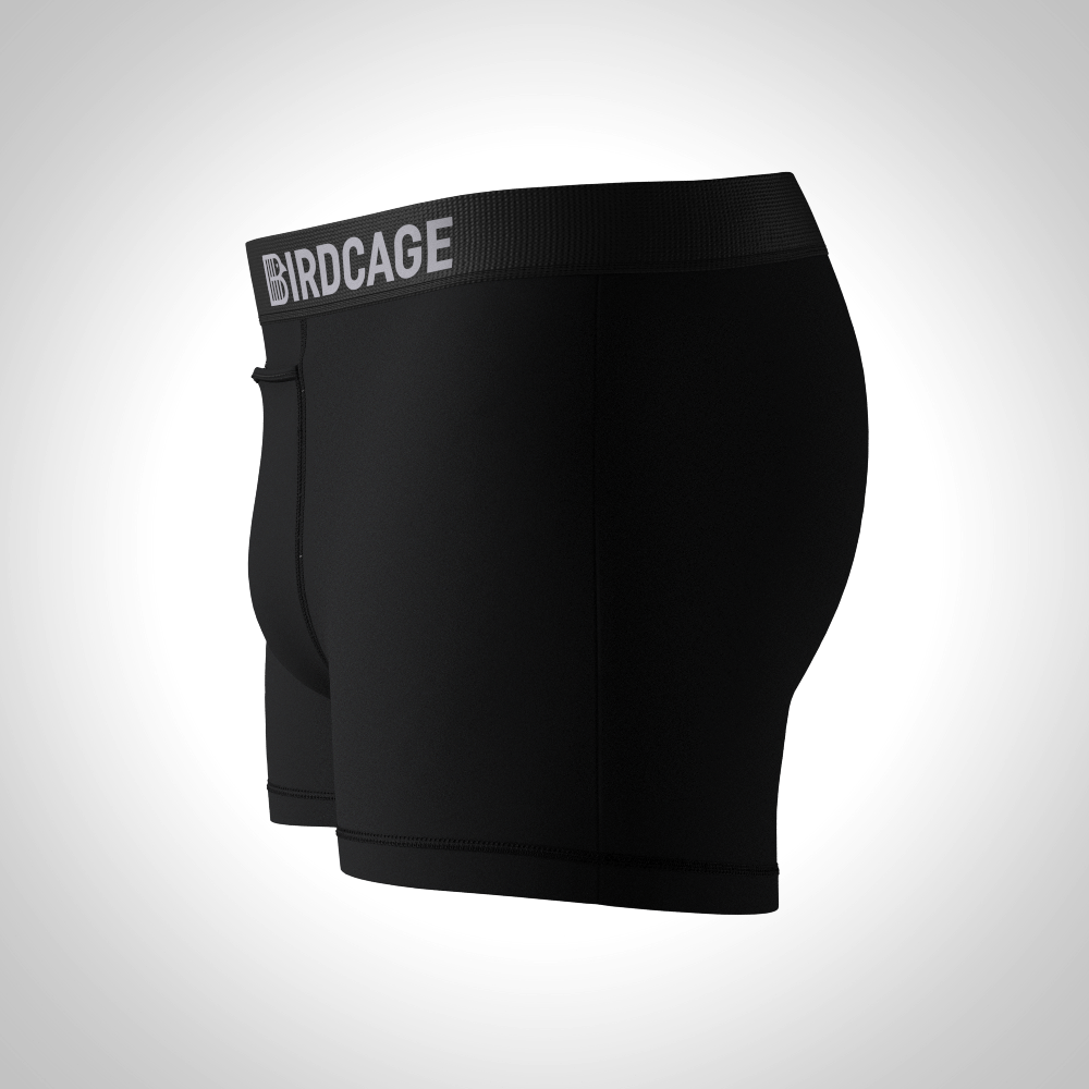 Black underwear with 'BIRDCAGE' waistband on a light gray background. birdcage mens underwear soft modal cotton with top fly
